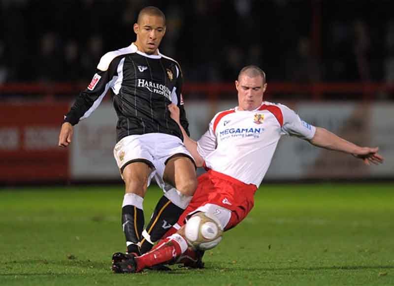 Darren Murphy puts in a tackle